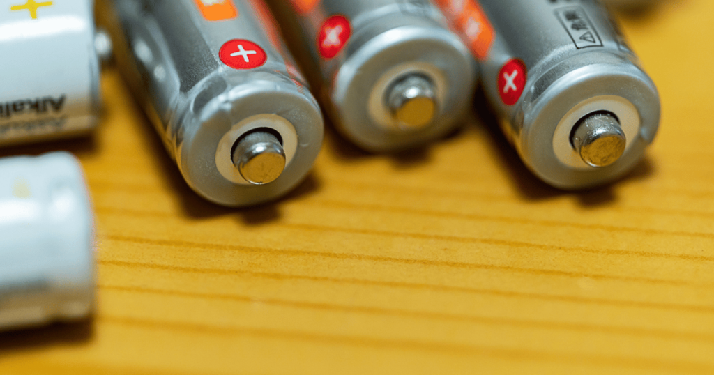 batteries on a wooden table